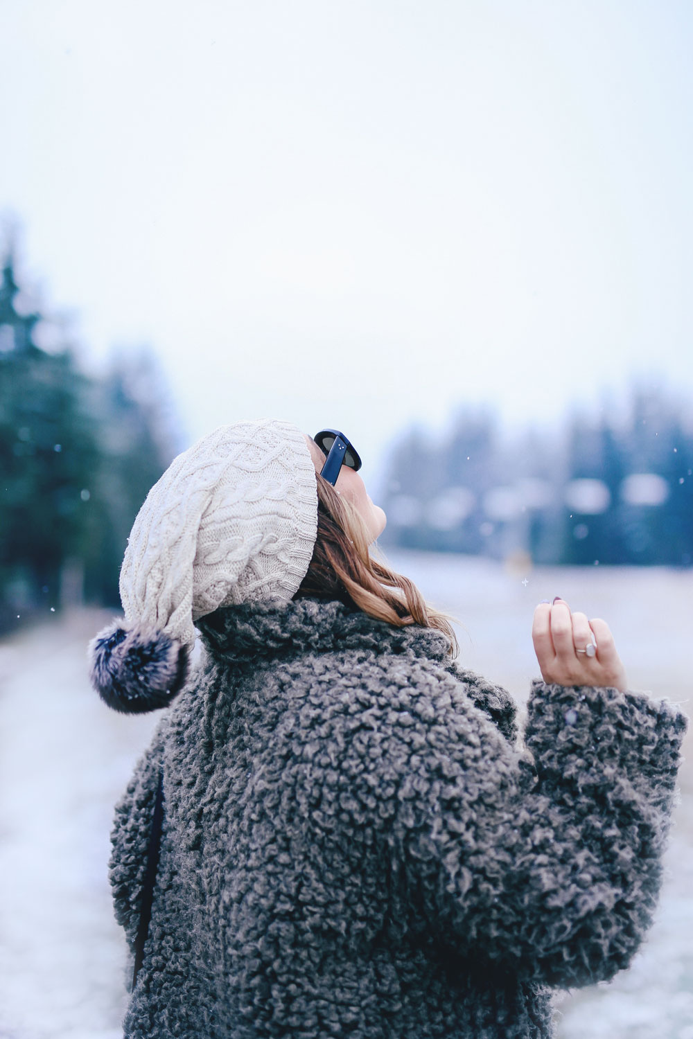 Whistler travel guide at the Fairmont Chateau Whistler with To Vogue or Bust in an Aritzia teddy coat, Hudson black skinny jeans, Joe Fresh snow boots, Tilley Hats beanie and Aritzia black leather bag