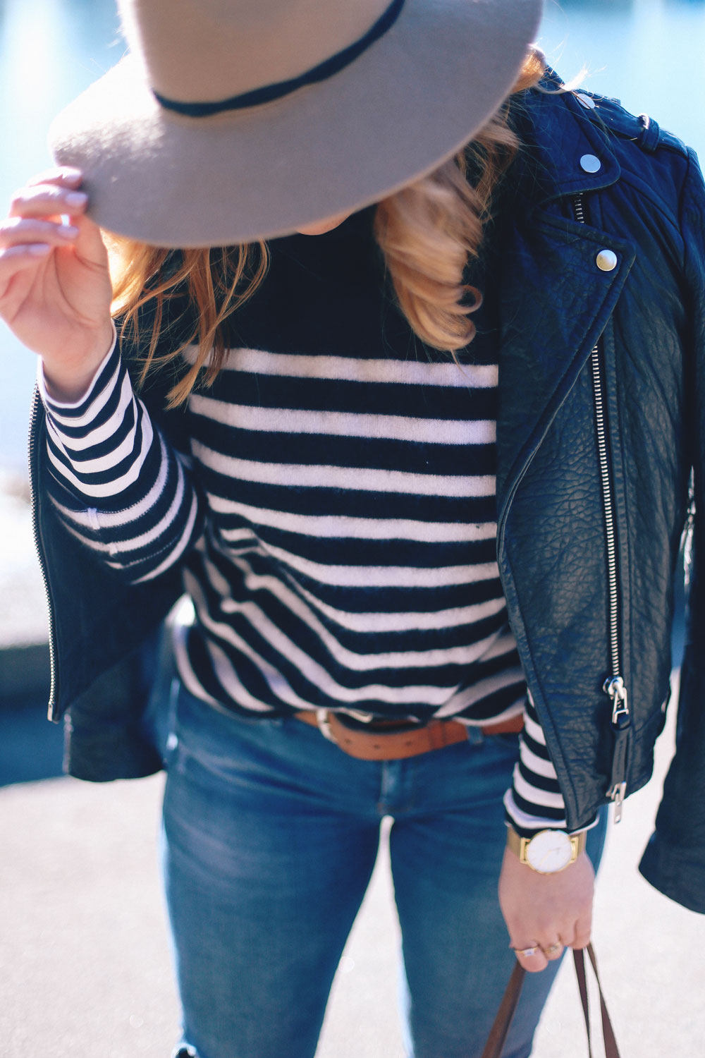 Spring 2017 style trends, how to wear stripes, how to wear ankle boots, in Mavi skinny jeans, Express fedora hat, White Warren cashmere sweater, Mackage leather jacket styled by To Vogue or Bust