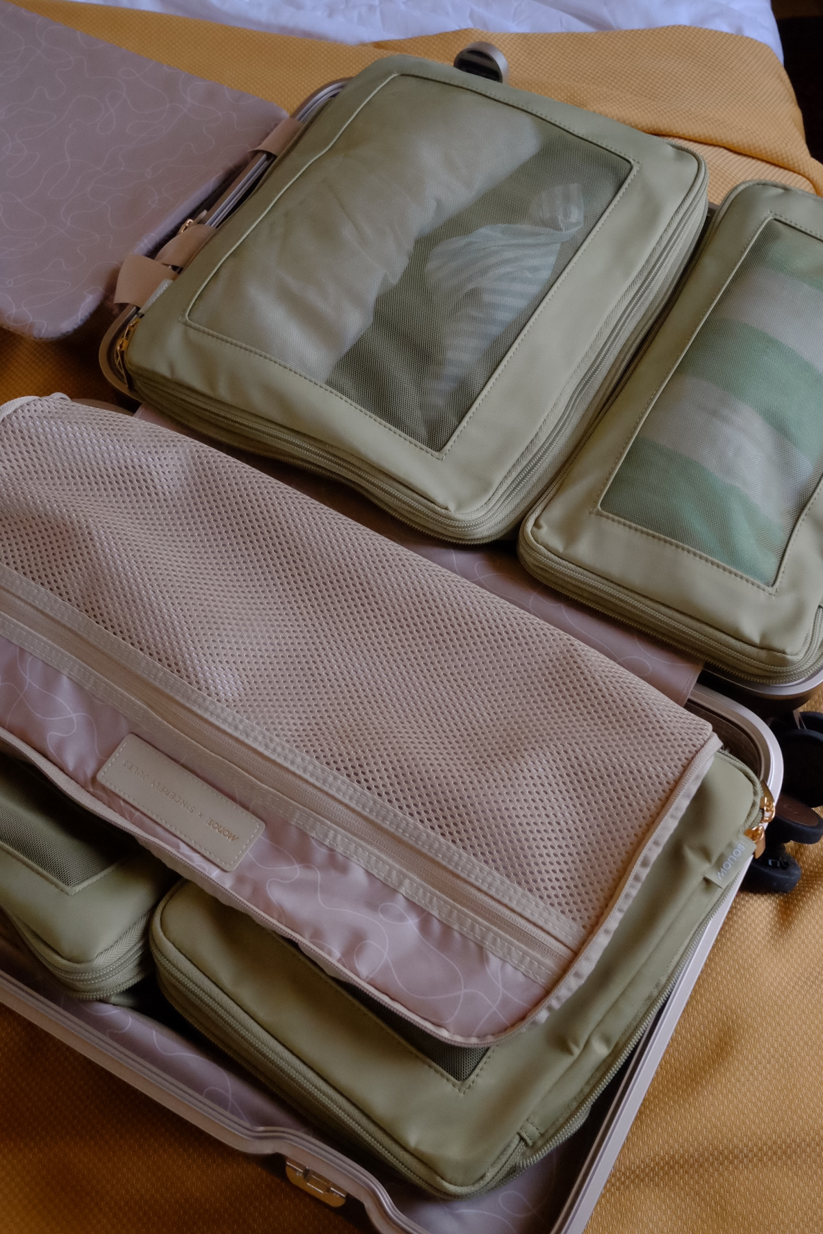 Packing cubes in use for Monos hybrid carry-on luggage